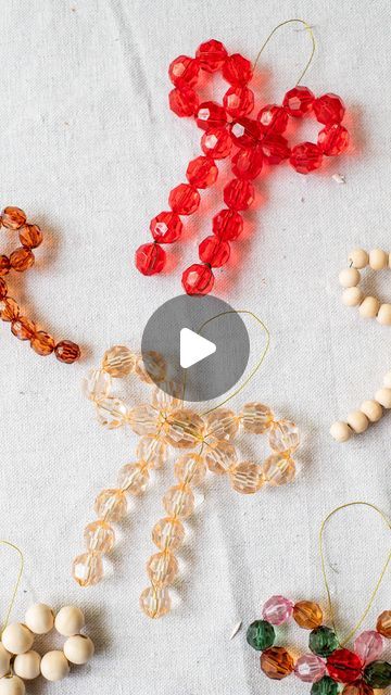 Geneva Vanderzeil | Making beaded bow ornaments! So many of you have asked for a slowed down tutorial for these so here it is. They are actually so easy to... | Instagram Beads And Safety Pins Crafts, Diy Bead Bow Ornaments, Diy Beaded Bow Ornaments, Aesthetic Ornaments Diy, Beaded Bow Ornament Diy, Handmade Beaded Ornaments, Large Bead Crafts, Easy Beaded Christmas Ornaments, Christmas Ornaments With Beads Diy