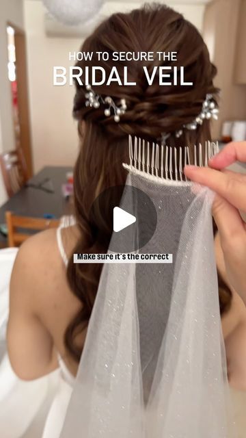 Iheartblooms, by Jenn on Instagram: "How to secure the bridal veil on a half-up hairstyle ⭐️ 

1. Choose a bridal veil that comes with a comb; this makes it much easier to put on and remove at any time during the day as you change between outfits. Check with the bridal studio for their bridal veil recommendations. 

2. Position the bridal veil in the centre of the back of the head. Wiggle the comb towards the scalp and downwards. 

3. Secure the bridal veil with one bobby pin across the comb on the right side. If the veil is long, use one bobby pin on the right side of the comb and another on the left side of the comb.

Please forward this video to your sister or bridesmaid, who is helping you with removing the bridal veil in-between outfit change on your wedding day. ❤️" Side Hairstyles Wedding With Veil, Wedding Chignon With Veil, How To Put A Veil In Hair, Veil With Open Hair, Hairstyles For Wedding With Veil, Vail Hair Down, Sister Wedding Hairstyle, Half Up Half Down Hairstyles With Veil, How To Put On A Veil