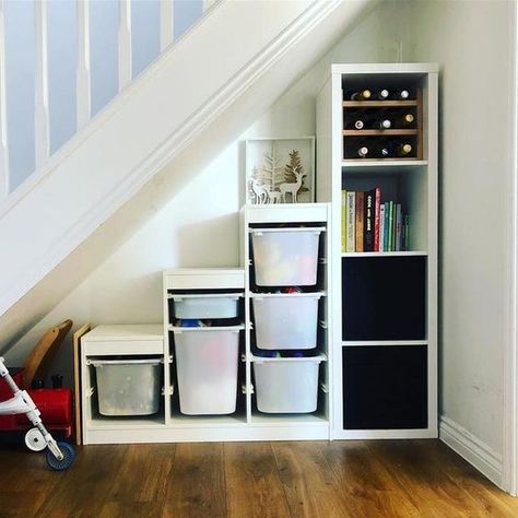 a cool way to use IKEA KALLAX shelves under stairs Ikea Under Stairs, Living Room Under Stairs, Shelves Under Stairs, Under The Stairs Storage, Under Stairs Ideas, Under Stairs Storage Solutions, Ikea Kallax Shelving, Space Under Stairs, Stair Nook