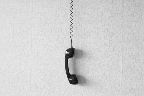 black old handset with a wire hang against wallpaper texture. black plastic telephone hanging by the cord.Retro Phone Cord - Vintage Telephone Handset Receiver hanging by the Cord down Numbers To Call, Wallpaper Texture, Wall Phone, Vintage Phone, Phone Cords, Doodle Icon, Retro Phone, Vintage Phones, Vintage Telephone