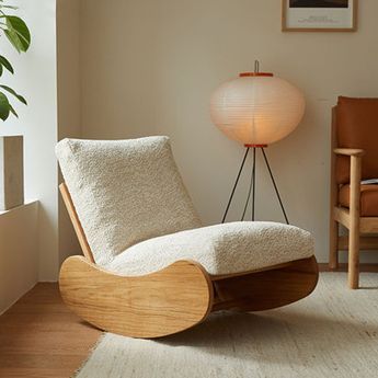 In the hustle and bustle of modern life, we all crave a serene corner to unwind and rejuvenate. This white oak rocking chair is the perfect choice for just that. Crafted from high-quality white oak, it exudes a subtle yet luxurious feel with its sturdy texture and natural grain. The soft white fleece cushions on the seat and back offer a contrasting touch, creating a comfortable seating experience. Imagine sitting in this rocking chair on a sunny afternoon, gently swaying with the breeze, embrac Aesthetic Rocking Chair, Product Design Chair, Aesthetic Furniture Living Rooms, Rocking Chair Modern, Modern Wood Chair Design, Rocking Chair Aesthetic, Floor Rocking Chair, Aesthetic Chairs, Luxury Chair Design