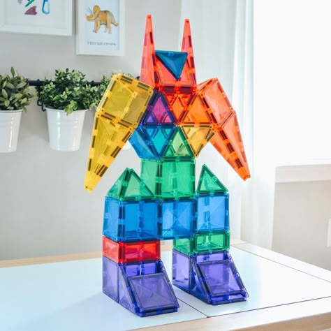 April Karschner on Instagram: ““AUTOBOTS, ROLL OUT!”⠀ ⠀ Anyone else’s kids obsessed with Transformers?⠀ ⠀ I’ll sometimes let Lincoln scroll a hashtag to find inspiration…” Magnatile Ideas, Magnatiles Ideas, Connetix Tiles, Magnetic Building Toys, Magnet Tiles, Magna Tiles, Tiles Ideas, Magnetic Tiles, Open Ended Toys