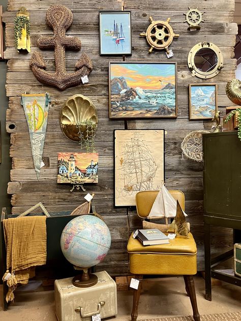 Vintage Nautical Home Decor — West and Found Design Co. Display Wall Ideas, Nautical Gallery Wall, Pirate Wall Decor, Nautical Books, Vintage Booth Display, Vintage Nautical Decor, Vintage Booth, Nautical Home Decor, The Beach House