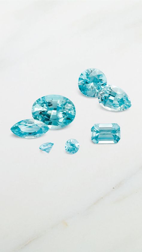 Blue zircon combines a gorgeous teal color with fiery brilliance akin to diamonds. In fact, for centuries, people confused colorless zircon with diamond. 💙💎  Learn more about blue zircon, one of December's three blue birthstones, on the blog today! Design Board, Colored Gems, Blue Gems, Gem Stones, Teal Color, Blue Zircon, Blue Gemstones, Teal Colors, Shape Design