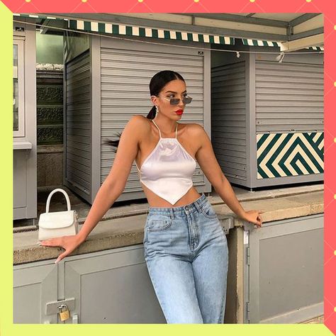 Descubre cuáles son las prendas que te favorecen según tu tipo de cuerpo. ¡Vístete como una sexy sirena esta primavera con los outfits favoritos de 2021! La entrada 10 outfits para el calor que favorecen a las que tenemos caderas anchas se publicó primero en Mujer de 10: Guía real para la mujer actual. Entérate ya.. How To Feel Beautiful, Mom Jeans, Camisole Top, My Style, Tumblr, Tank Tops, Books, Pants, Women's Top