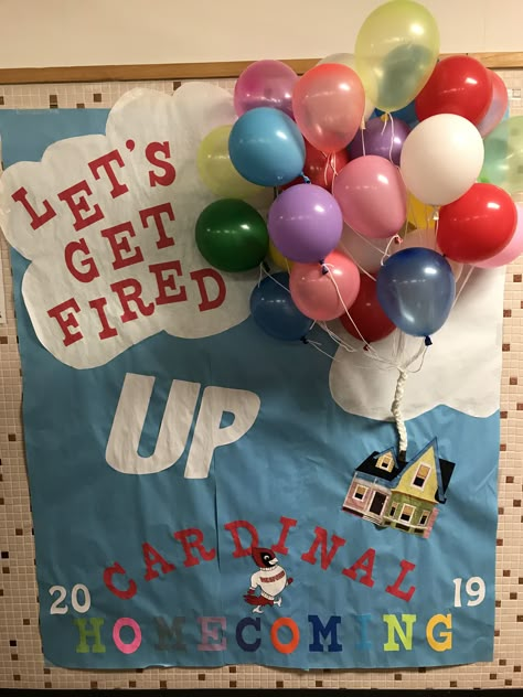 “Let’s Get Fired UP” spirit poster using Disney’s UP as theme - Spirit Week Disney Theme Disney Themed Pep Rally, Homecoming Wall Decorations, Disney Themed Hallway Decorations, Disney School Spirit Week, School Hallway Posters, Senior Homecoming Hallway Themes, Homecoming Poster Ideas Spirit Weeks, Disney Theme Homecoming Floats, Class Floats Homecoming