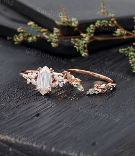 Long hexagon Moissanite Engagement ring Set Vintage moss agate engagement ring Rose gold Cluster shank marquise cut leaf Bridal set promise ABOUT THIS RING Beautiful Moissanite engagement ring set -------------------------------------------------------- 「Product Summary」 Engagement Ring * Center Stone: 5*10mm moissanite  or Simulated  Diamond (hexagon cut) * Side Stones: 1.5*3mm Marquise cut Moissanite                           1.7mm Round Moissanite Or Side Stone: Simulated Diamond * Total Cara Moss Agate Engagement Ring, Moissanite Engagement Ring Set, Cute Engagement Rings, Agate Engagement Ring, Custom Wedding Rings, Engagement Ring Rose Gold, Full Eternity Ring, Round Moissanite, Ring Rose Gold