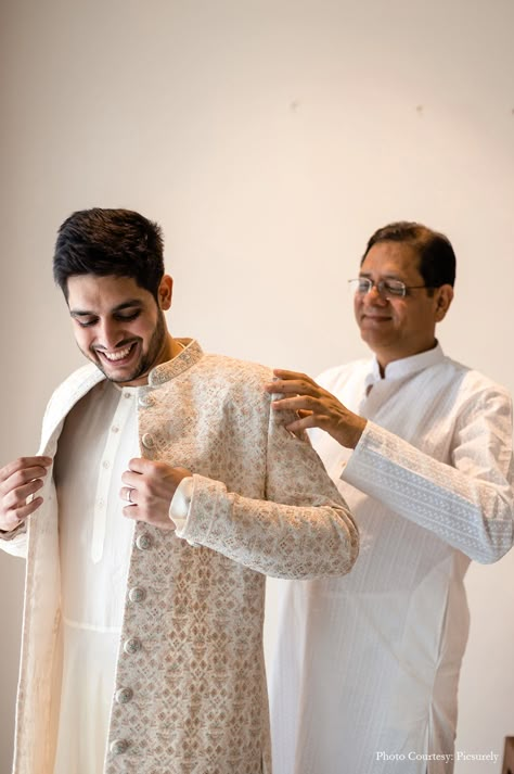 groom outfit, groom father, groom outfit, groom to be, wedding day, wedding outfit, indian wedding, sherwani, groom look, groom ring, ring band, groom dad, father, groom, son father, behind the scenes, family, wedding festivities, sherwani groom, sherwani father Outfit Indian Wedding, Marriage Poses, Grooms Outfit, Indian Wedding Pictures, Bridal Entry, Outfit Indian, Groom Photoshoot, Family Portrait Poses, Indian Wedding Couple Photography