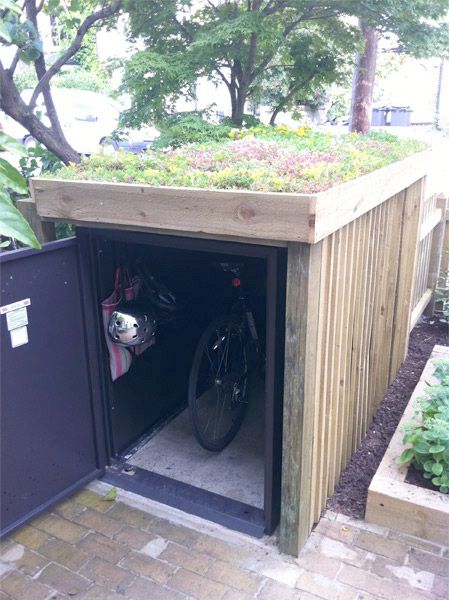 hide that asgard bike storage Asgard Bike Storage, Garden Bike Storage, Bike Locker, Outdoor Bike Storage, Bike Shelter, Grass Roof, Outdoor Biking, Bicycle Storage, Bike Store