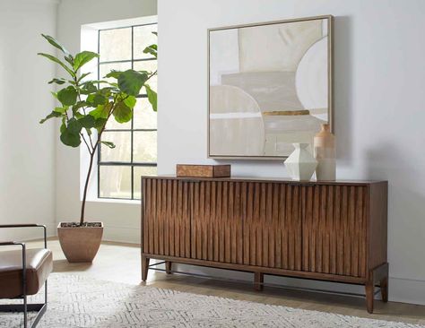 Experience the magic of mid-century modern design as you revel in the practicality of our Delray console. Immerse yourself in the nostalgia of a time gone by, while enjoying the convenience of state-of-the-art storage solutions. #homefurnishings #martinfurniture #martinhomefurniture #designinspo #entertainmentfurniture #accentfurniture #furniture #interiordesign #freshdesigns Credenza Office, Office Console, Credenza Decor, Mid Century Console, Modern Media Console, Bookcase With Glass Doors, Living Room Console, Mid Century Modern Wood, Furniture Material