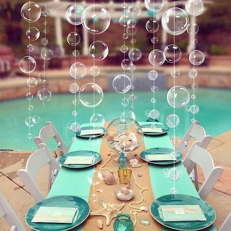 Create a whimsical undersea atmosphere at your next pool party with the vibrant Party Decorations 2D Bubble Cut Out Garland! Hang these playful hanging streamers featuring underwater bubbles and watch the party come alive. Perfect for poolside celebrations and summer gatherings, this decoration will add a touch of magic to your event! #afflink Bubble Garland, Ocean Birthday Party, Mermaid Birthday Party Decorations, Bubble Birthday, Mermaid Party Favors, Ocean Birthday, Bubble Party, Sea Baby Shower, Birthday Wall