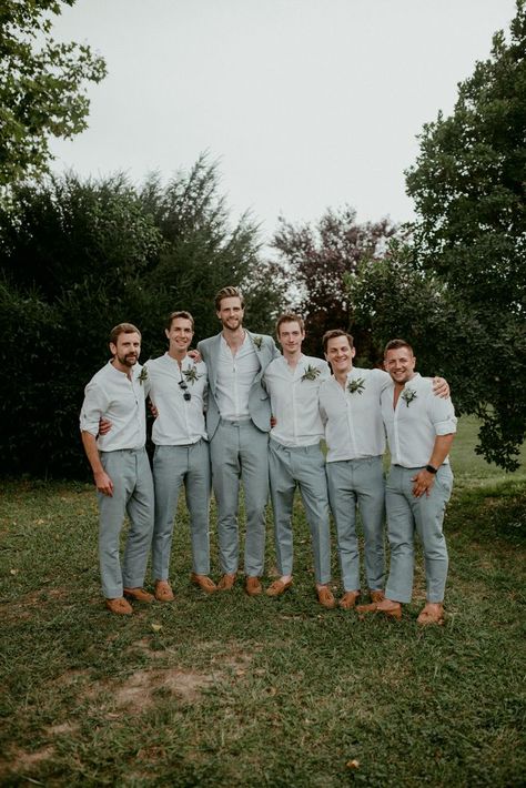 Contrasting Groom And Groomsmen, Grey Men’s Suit Wedding, Mens Wedding Attire For Big Guys, Groomsmen Suits White, Grey Groomsmen Attire Casual, Garden Theme Wedding Groomsmen, Groomsmen Attire Backyard Wedding, Groomsmen Outfit Ideas Grey, Wedding Suits Groom Casual