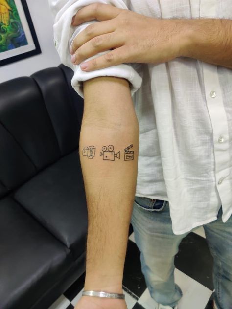 Film Tattoos Ideas, Film Clapper Tattoo, Small Tattoos Camera, Lights Camera Action Tattoo, Video Editor Tattoo Ideas, Videography Tattoo Ideas, Small Film Tattoo, Film Tatoos Ideas, Tattoos For Actors