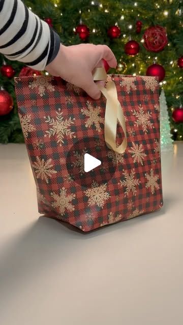 Gift Wrapping With Photos, Wraping The Gifts Christmas, Wrapping Hard To Wrap Gifts, How To Wrap A Blanket For Christmas, Wrapping Sweater Gift, Wrap Presents How To, How To Wrap A Vinyl Record, Gift Wrapping A Blanket, Gift Wrapping Clothes Ideas