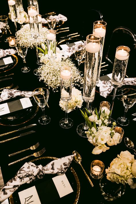 Black Gold Table Setting Wedding, Black On Black Table Setting Wedding, Ebony And Ivory Theme Party, Black And Gold Venue Decorations, Black Cream And Gold Wedding Decor, Black And Gold Nye Wedding, Black Gold And White Dinner Table, Wedding Table Decorations Black And Gold, Black White And Gold Wedding Reception Decor