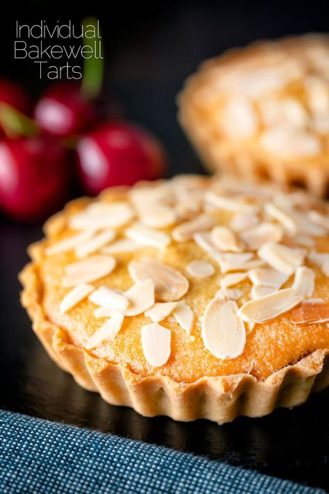 Mini Bakewell tarts, a scaled-down version of a true British favourite featuring a sweet crust pastry filled with cherry jam and frangipane. This recipe makes 4 perfect individual tartlets and they will last, if stored properly, for 3-4 days. Individual Bakewell Tarts, Mini Bakewell Tart Recipe, Mini Bakewell Tart, Pastry Tarts Desserts, Mini Tarts Filling Ideas, Mini Tarts Recipe Dessert, Cherry Bakewell Tart Recipe, Tart Fillings Ideas, Mini Tarts Dessert Easy Recipes