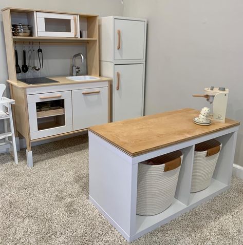 Preschool Play Kitchen Area, Playroom With Toy Kitchen, Diy Play Checkout Counter, Kitchen In Playroom, Cube Shelf Play Kitchen, Playroom Kitchen Organization, Playroom Play Kitchen, Play Kitchen Counter Space, Playroom Kitchen Set Up