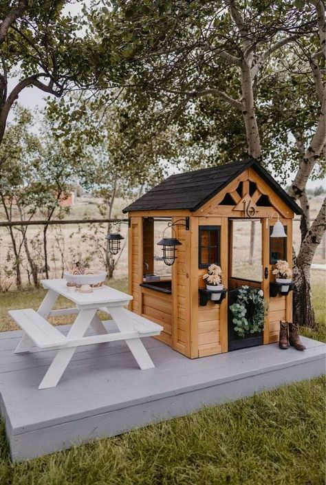 Discovery Playhouse Makeover, Small Backyard Playhouse, Playhouse In Backyard, Outdoor Playhouse Setup, Playhouse Backyard Ideas, Kid Friendly Outdoor Spaces, Yard Playground Ideas, Outdoor Playhouse Area, Outdoor Play Village