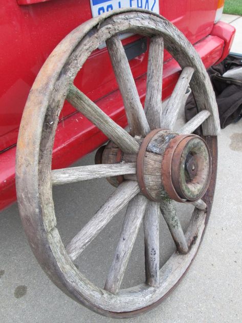 I picked a very old wood spoked wagon wheel today. The wood is in pretty rough shape but most all of it is there. I looked up on google ways to preserve it other than traditional clear wood stain waterproofing and found that linseed oil cut with turpentine works well. Anyone have any experience... Antique Wagon Wheels, Wooden Wagon Wheels, Wood Wagon, Wagon Wheels, Amazing Furniture, Old Wagons, Wooden Wagon, Wheel Repair, Wagon Wheel