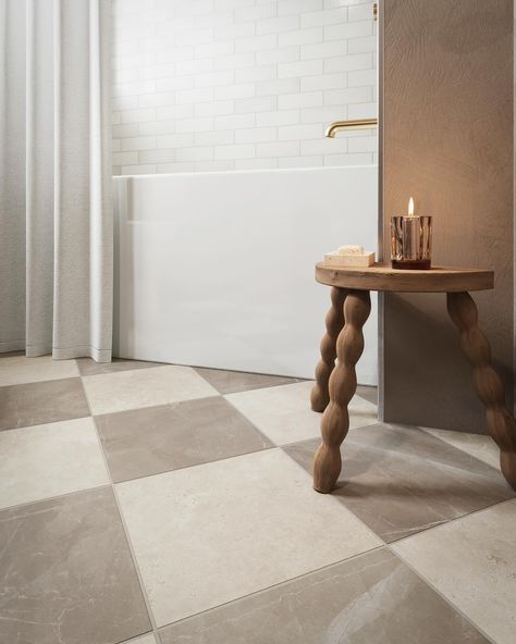 Step into timeless charm with this beautiful bathroom design by @edward.martin! Featuring classic checkered floors, a soft neutral palette, and brass accents, this space strikes the perfect balance between modern elegance and vintage warmth. The arched shower frame and natural textures add a touch of serenity, making it a true sanctuary ✨ Discover more luxurious inspiration through the link in bio ☝🏻 Get the best interiors 👉 @homes_society #maisonvalentina #luxurybathroom #dreambathroom #... Diamond Tile Floor, Vinyl Tile Flooring Bathroom, Brown Tile Bathroom, Vintage Bathroom Tile, Mudroom Flooring, Brown Tile, Laundry Room Flooring, Matte Porcelain Tile, White Bathroom Tiles