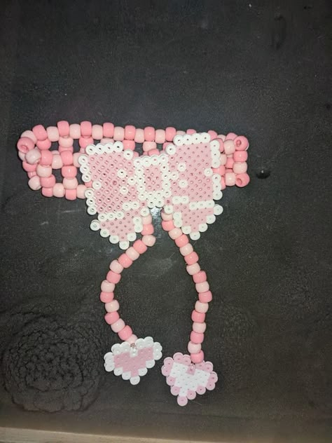 Kawaii Pearl Beads, My Melody Kandi Pattern, Kandi Rosary, Cutecore Perler Bead, Sanrio Kandi Patterns, Kandi With Perler, Kandi Perler Ideas, Kandi Bow, Cutecore Kandi