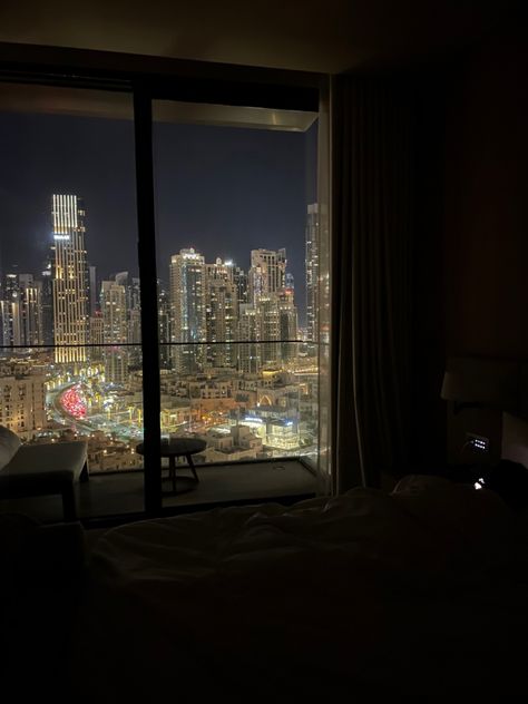 amazing view of dubai at night from hotel room Sky Scrapers At Night, Dubai Room View, Hotel Room Aesthetic Night, Dubai Hotel Room, Dubai Night View, Welcome To Dubai, Rooms Wallpaper, Nice Bedrooms, Dubai Night