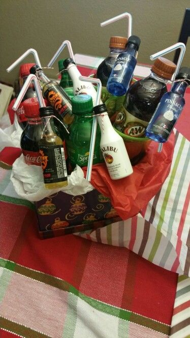 Mini alcohol bottles and mini soda bottles in a gift basket. Perfect as a gift to couples. Alcohol Gift Baskets, Mini Alcohol Bottles, Yankee Swap, Drink Gifts, Christmas Gift Baskets Diy, Liquor Gifts, Mini Liquor Bottles, Adult Gifts, Raffle Baskets