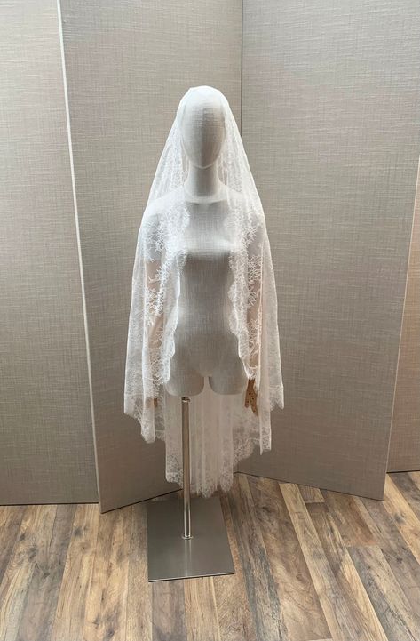 "This stunning mantilla veil with super delicate Chantilly lace will add a soft romantic touch to your wedding look. Hand made entirely with beautiful floral soft high-quality lace. The veil is secured in your hair with the comb on top of your head. This Ballet length veil measures 64\" long from the hair comb to the bottom of the veil. The color of the veil is soft white and will work with white or diamond white/light ivory dresses. Also available in the shorter length. * RETURN POLICY - We do not accept returns for a refund as all of out items are made to order. But please contact us if you are having an issue with your order. - We do accept exchanges. You can exchange your items for something else in our shop. The items you would like to exchange should be shipped back in the original c Short Lace Veil, Hallowedding Dress, Mantilla Veil Wedding Spanish Style, Lace Vail, Spanish Veil, Long Veils, Long Lace Veil, Mantilla Veil Wedding, Spanish Mantilla