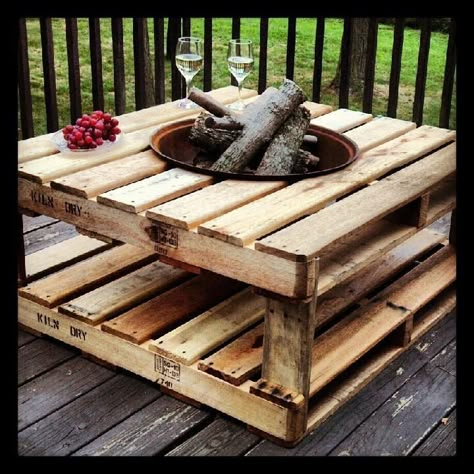 Upcycle pallets into fire pit table, maybe use brick or tile to help prevent any stray embers from sparking the pallets. Diy Pallet Projects For Beginners, Pallet Projects For Beginners, Pallet Fire Pit, Diy Wood Pallet Projects, Pallet Projects Furniture, Pallet Patio, Pallet Designs, Pallet Project, Pallet Decor