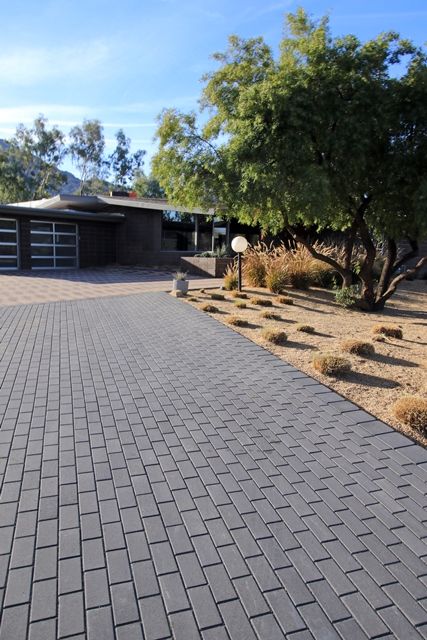 We love the rich charcoal color of these beautiful pavers! #ackerstone #pavers #holland #icpi Driveway Pavers Design, Cement House, Modern Driveway, Driveway Pavers, Pavers Design, Paver Designs, Pavers Backyard, Concrete Patio Designs, Driveway Paving