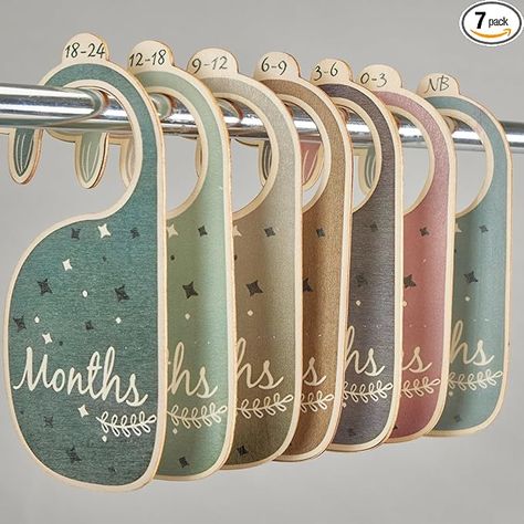 [Premium Nursery Decor]: Enhance the beauty of your baby's wardrobe with these wooden closet dividers which will complement any nursery theme [Wonderful Hanger Dividers]: These dividers fit perfectly on standard sized hangers, making it easy to separate clothes by age, size or seasons Hanger Dividers, Wooden Closet, Closet Hangers, Baby Hangers, Small Nurseries, Closet Dividers, Nursery Closet, Baby Closet, Nursery Theme