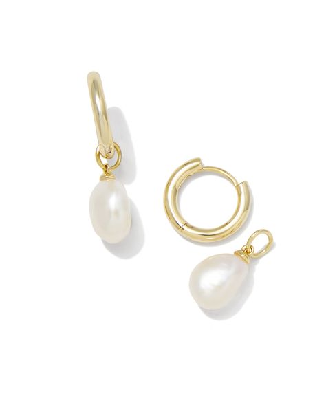 Classy and chic, we’re obsessed with the Willa Gold Pearl Huggie Earrings in White Pearl—and you will be, too! A dainty cultured freshwater pearl dangles from a petite huggie for a lightweight style you’ll pair back with any stack. Metal 14k Gold Over Brass Material White Pearl Closure Ear Post Size 1.8" Outside Diameter, 0.4"L X 0.3"W CharmDue to the one-of-a-kind nature of the medium, exact colors and patterns may vary slightly from the image shown. | Kendra Scott Willa Gold Huggie Earrings in White | Pearl Gold Huggie Earrings, Huggie Earrings Gold, Kendra Scott Necklace, Kendra Scott Earrings, Pearl Hoop Earrings, Freshwater Cultured Pearls, Huggie Earrings, Stylish Jewelry, Brass Material