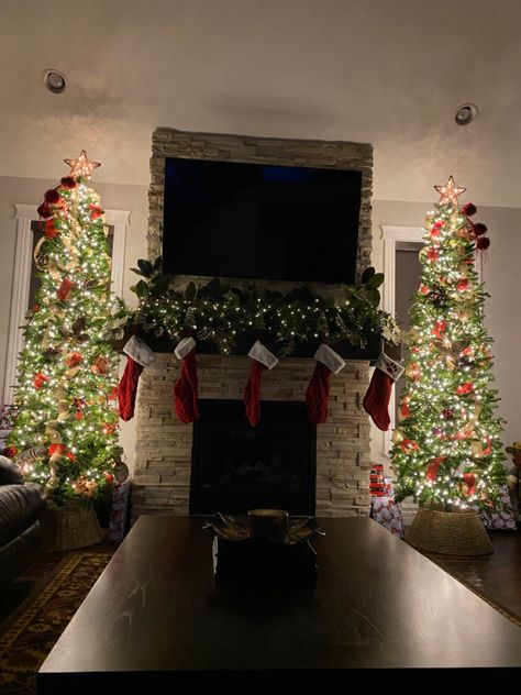 Twin Christmas Trees, Two Christmas Trees In Living Room By Fireplace, Christmas Trees On Each Side Of Fireplace, Holiday Fireplace Garland, Christmas Tree Fireplace Decor, Decorate Sides Of Fireplace, Christmas Tree Next To Fireplace, Christmas Fireplace With Tv, Christmas Trees By Fireplace