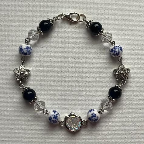 Selling on my instagram: norigazing #handmade #jewelry #bracelet #blue #navy #flower #flowercharm #beads #clear #white #clear #aesthetic #smallbuisness #elegant Clear Aesthetic, Bracelet Blue, Clear White, Jewelry Bracelet, Blue Bracelet, Flower Charm, Handmade Jewelry, Charms, Bracelet