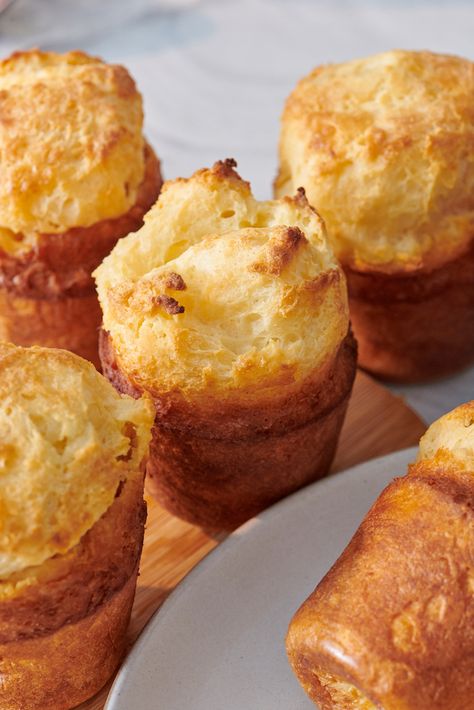 Cheesy Popovers are light and airy dinner rolls that have an irresistible golden crispy exterior. They pair perfectly with nearly every meal! Dinner Muffins, Popovers Recipe, Easy Popovers, Popover Recipe, Savory Scones, Bisquick Recipes, Savory Dinner, Dinner Rolls Recipe, Yorkshire Pudding