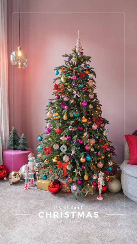 Sparkling Celebration - Bold Colors, Cheerful Figures, and Plenty of Gold

Get ready for a Sparkling Celebration! This trend is perfect for anyone who loves bold and dazzling Christmas decorations. With vibrant colors like fuchsia, turquoise, lime yellow, and soft pink, you can create a festive and joyful atmosphere at home. Bright Coloured Christmas Decorations, Bright Colorful Christmas Tree, Christmas Tree Ideas Kid Friendly, Colourful Christmas Tree Decorations, Multi Colored Christmas Tree Decorations, Christmas Tree Colourful, Multi Color Christmas Tree Decorations, Christmas Tree Multi Color Lights Decor, Bright Color Christmas Decor