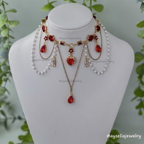 Red Necklace ❤️ . . . .#fairycoreaesthetic #fairycorefashion #fairycorejewelry #fairyaesthetic #fairymagic #fairyvibes #dreamyvibes #fairyforest #fairycosplay #fairytalefashion #cottagecoreaesthetics #cottagecorejewelry #beadedjewelry #celestialjewelry #cottagecoredream #cottagecoregirl #cottagecorevibes #cottagewitch #gemstonenecklaces #magicjewelry #sparklejewelry #magicaljewelry #crystalnecklace #aestheticlover #fairycorenecklace #beadednecklaces #angelcoreaesthetic #princessvibes #neckla... Bridgerton Jewelry, Cottage Core Jewelry, Fairycore Jewelry, Ethereal Jewelry, Delicate Choker, Pretty Jewelry Necklaces, Princess Jewelry, Fancy Jewellery Designs, Fashion Boards