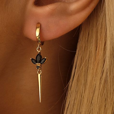 Real Gold Dangle Earring with sparkling Black Cz Gems We are producing the Dangle Earring in 10K, 14K, 18K gold  * 100% 14k  Solid Yellow Gold (Not Gold Vermail or Not Gold Plated) *  2,85gr/10K pair , 3,15gr/14K pair , 3,65gr/18K pair  * Sold as a pair   A+ Black Tone Cubic Zirconia clear simulated diamonds * Each Earring has 3pcs of marquise cut Cz Black Crystals * Drop Lotus+Spike Height: 4,5cm / 1,8inch * Polished finish EU and UK taxes; *EU and UK orders over £135/€150 are subject to customs, import duties and tax charges once they reach their destination. This means that the recipient will be responsible for all customs, import duties and sales taxes that may apply locally to the purchase. Return Policy; Buyer is responsible for return shipping and customs costs and any loss in value Gold Plate Earrings, Black And Gold Ear Piercings, Gold And Black Earrings, Earrings With Black Dress, Black Earrings Aesthetic, Black Outfit Gold Jewelry, Black Jewelry Aesthetic, Gold And Black Jewelry, Black And Gold Jewelry