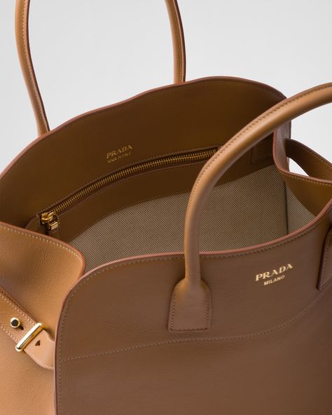 Caramel Large leather tote bag with buckles | PRADA Margaux Bag, Prada Leather Tote, Elegant Signature, Prada Tote Bag, Prada Collection, Large Leather Tote Bag, Chocolate Brown Colour, Large Leather Tote, Everyday Tote