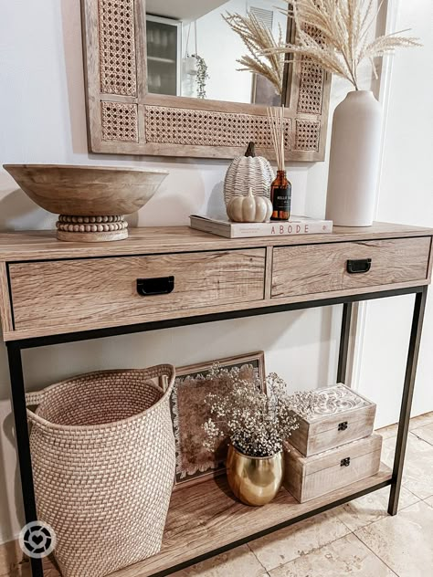 Neutral, boho & subtle fall entryway decor refresh! Entryway Desk Decor, Console Table Decorating Picture Frames, Boho Living Room Console Table, Console Basket Decor, Entryway Table Bottom Shelf Decor, Decorating Bottom Shelf Of Sofa Table, Entry Table Bottom Shelf Decor, Doorway Table Decor, Sofa Table Baskets