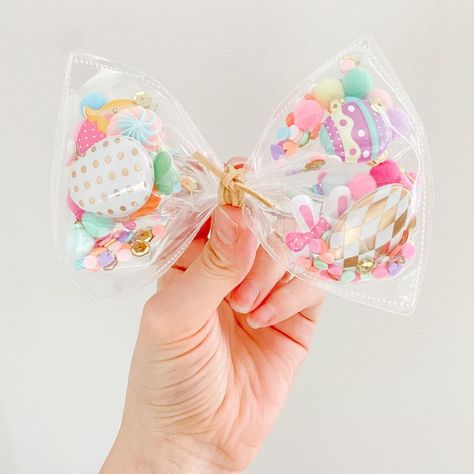 Tiny Trends By MA | 𝓜𝓮𝓵𝓪𝓷𝔂 on Instagram: “Happy Saturday! What are you up to this weekend?! . We still have a few Easter shaker bows in stock - Filled with pom poms, sequence, and…” Shaker Bows, Happy Saturday, Pom Poms, This Weekend, Pom Pom, Easter, On Instagram, Quick Saves, Instagram