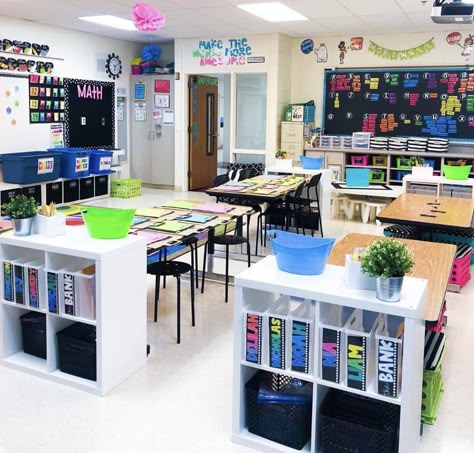 Classroom Setup With Tables First Grade, Classroom Table Storage Student, Second Grade Classroom Setup Ideas, Teacher Desk Arrangement Elementary, Fifth Grade Classroom Setup Desk Arrangements, Classroom Game Storage, Classroom Tables Organization, Classroom Table Ideas, 2nd Grade Classroom Setup Desks