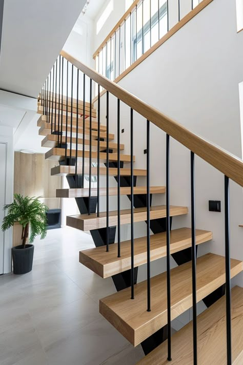 wooden floating staircase with metal railing Open Metal Staircase, Interior Staircase Design Modern, Open Staircase To Basement And Upstairs, Modernize Staircase, Under Open Staircase Ideas, Floating Staircase Design, Modern Wood Staircase, Floating Stairs Wood, Modern Staircase Design Ideas