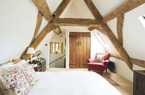 Real home: a Cotswold stone house is restored to its former glory | Real Homes Rustic Farmhouse Bedroom Ideas, Loft Conversion Bedroom, Rustic Farmhouse Bedroom, Period Living, Attic Bedrooms, Cottage Interior, Loft Room, Cottage Bedroom, Attic Bedroom