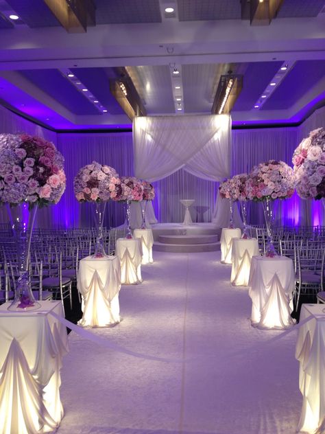 Beautiful aisle. Platinum and plum. Just gorgeous. The #Wedding Insiders  www.hotelarista.com Wedding Ceremony Backdrop Indoor, Purple Wedding Ceremony, Wedding Ceremony Decorations Church, Purple And Silver Wedding, Romantic Wedding Receptions, Church Wedding Decorations, Wedding Ceremony Backdrop, Ceremony Backdrop, Mod Wedding