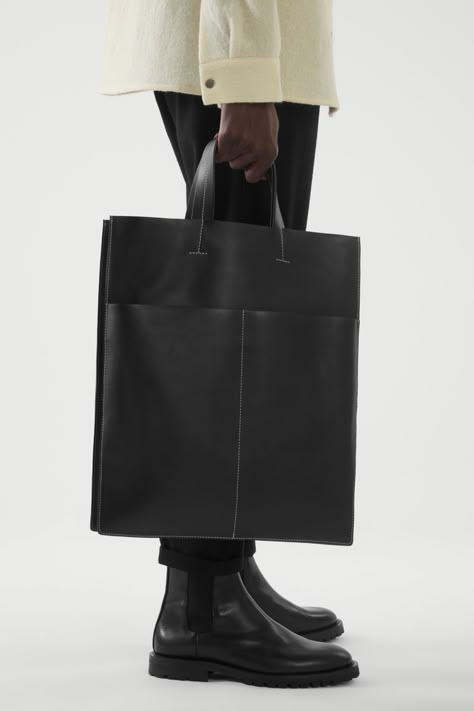 LEATHER TOTE BAG - BLACK - Bags - COS US Mens Leather Tote Bag, Minimalist Bags Design, Mens Tote Bag, Leather Bag Design, Contrast Topstitching, Soft Leather Tote, Men's Totes, Black Leather Tote Bag, Latest Bags