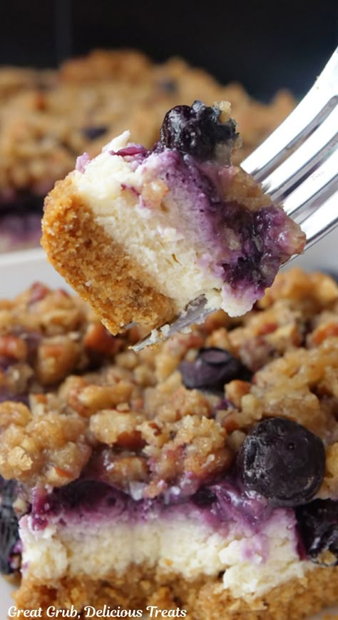 A bite of blueberry cheesecake on a fork. Blueberry Recipes Easy, Fresh Blueberry Recipes, Blueberry Desserts Recipes, Blueberry Cheesecake Bars, Rich Cheesecake, Cheesecake Layer, Pecan Topping, Blueberry Topping, Cheesecake Bar Recipes