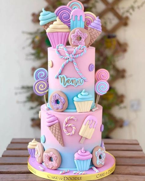 Top Cake Blog on Instagram: "Candy store 🍭🍫🍡🍭🍬🍫 Reposted from @cakeadoodle.qa Candyland. Express it with a cake @cakeadoodle.qa . #cakes #cake #cakedecorating…" Two Tier Donut Birthday Cake, Candy Birthday Theme Party, Candy Theme Cupcakes Ideas, Candyland Party Cake, Candy Bday Party, Candyland Birthday Food Ideas, Pastel Candy Cake, Candyland Birthday Cake Ideas, Candy Land Cakes Birthdays