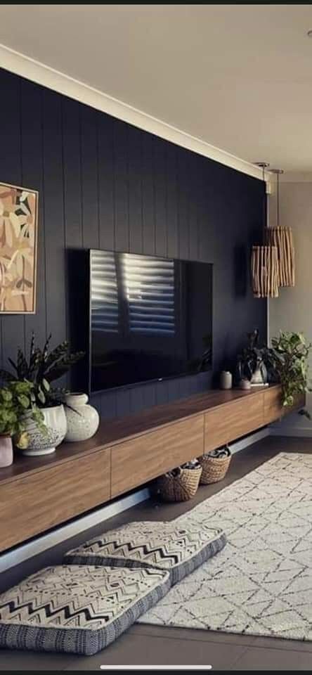 Dark Basement Tv Room, Dark Wall Tv Living Room, Charcoal Tv Wall, Wood Panel Wall Behind Tv, Black Wall With Tv On It, Tv On Dark Wall, Dark Grey Tv Wall, One Dark Wall Living Room, Tv With Windows On Both Sides