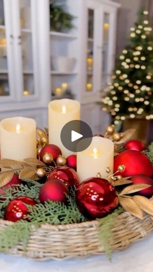 108K views · 1.6K reactions | Elegant Holiday Candle Garden❤️is a simple and stunning holiday centerpiece that combines a few iconic Christmas components setting up your holiday home in style! ✨https://ltk.app.link/CTKtJqOWWOb To style this centerpiece, I started with a faux cedar garland as a lush base for my trio of candles. I then layered in vibrant red ornaments of various sizes and finishes to add a dramatic Christmas flair. Finally, I softened the arrangement with gold accents, incorporating berry and bay leaf picks for that perfect finishing touch.Whether you have a large dining table or a cozy nook, this arrangement can be tailored to fit your space beautifully. #christmascenterpiece #christmasdiy #holidaydecor #holidaydiy #flamelessdecor | Janine Graff Faux Cedar Garland, Janine Graff, Candle Garden, Cedar Garland, Iconic Christmas, Christmas Styling, Holiday Candle, Xmas Deco, Large Dining Table